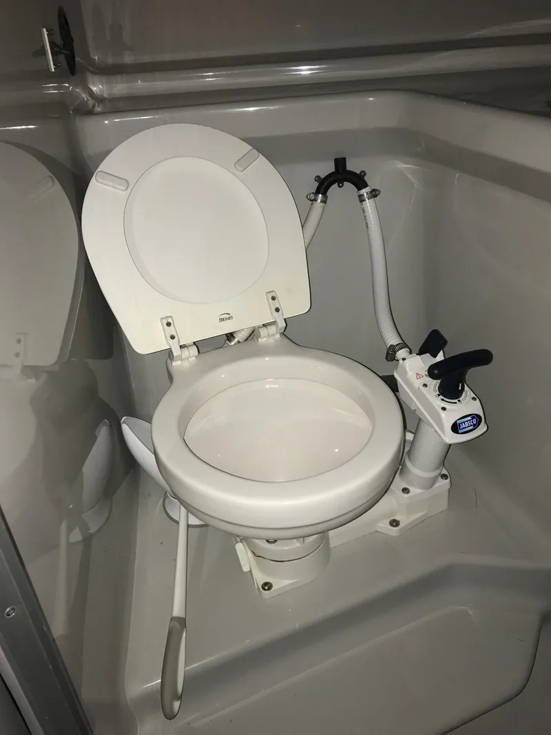 Slide: The Image of Marine toilet in 1991 Sea Ray 310/330 Sundancer boat bathroom. - 20