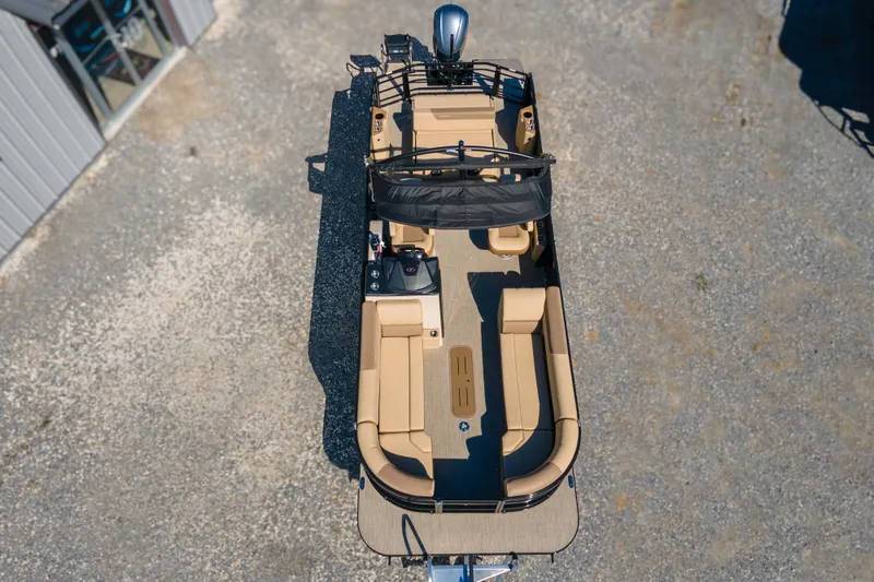 Slide: The Image of Aerial view of 2026 Veranda VR 265 VLI pontoon boat with beige seating. - 3