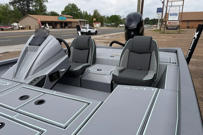 Slide: The Image of 2026 Xpress H20C Crappie boat with sleek design and dual seating. - 3