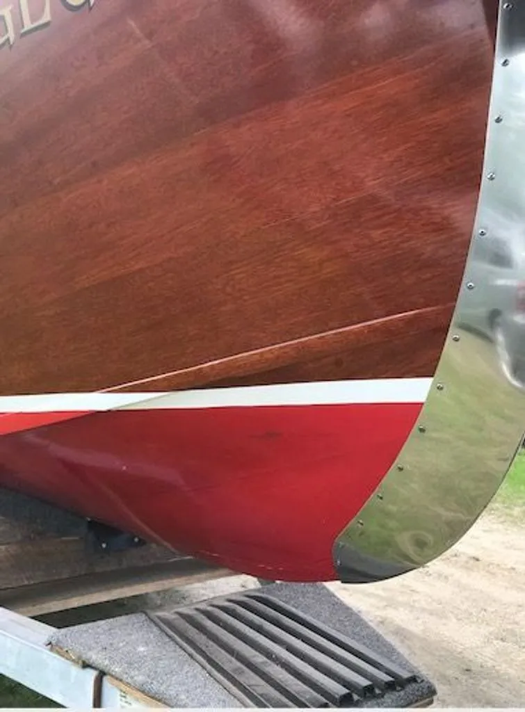 Slide: The Image of 1967 Chris-Craft 17 Deluxe boat hull with wood and metal trim. - 10