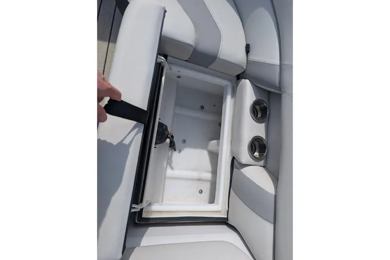 Slide: The Image of Open storage compartment in 2022 Viaggio 23 S boat with cup holders. - 6