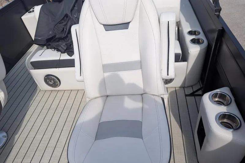 Slide: The Image of Luxurious seating on 2022 Viaggio 23 S boat with cup holders and speaker system. - 9