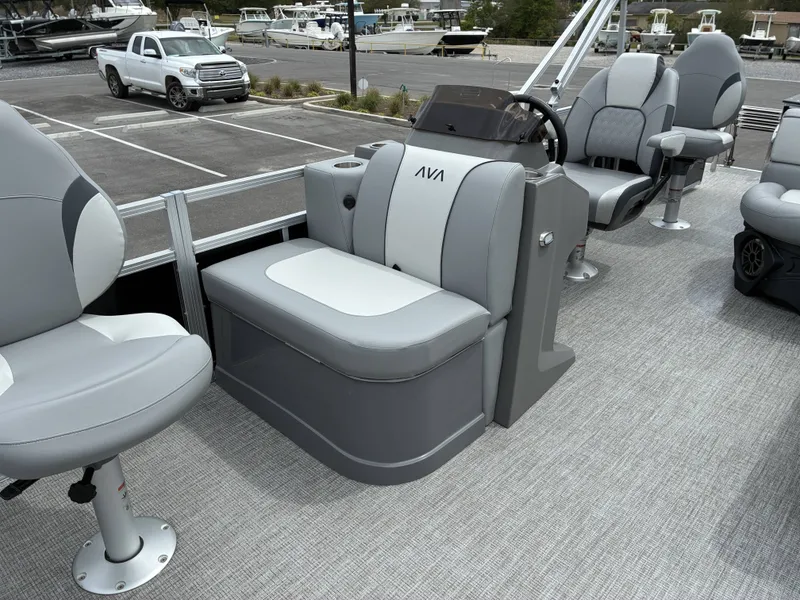 Slide: The Image of Interior of 2026 Avalon Venture Quad Fish with gray seating. - 10