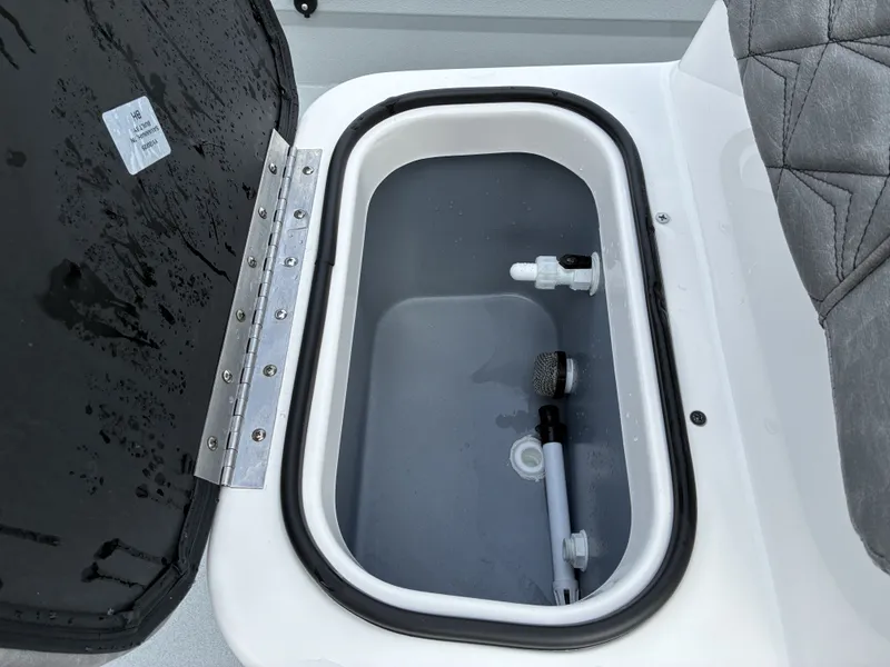 Slide: The Image of Avid 18CC ROGUE 2026 boat hatch with water fittings. - 11