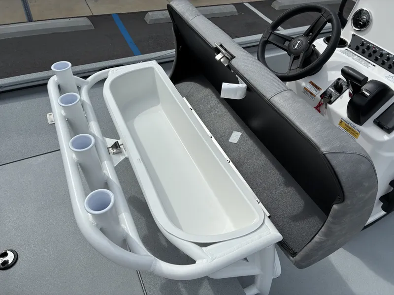 Slide: The Image of Avid 18CC ROGUE 2026 boat with bench seat and fishing rod holders. - 13