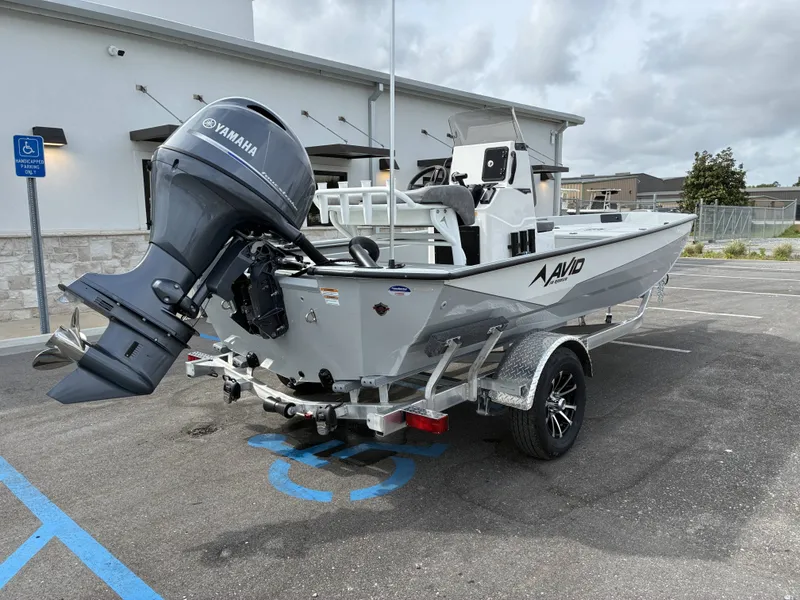 Slide: The Image of Avid 18CC ROGUE 2026 boat with Yamaha engine on trailer. - 3