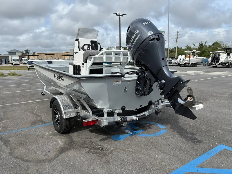 Slide: The Image of Avid 18CC ROGUE 2026 boat with Yamaha engine on trailer. - 5