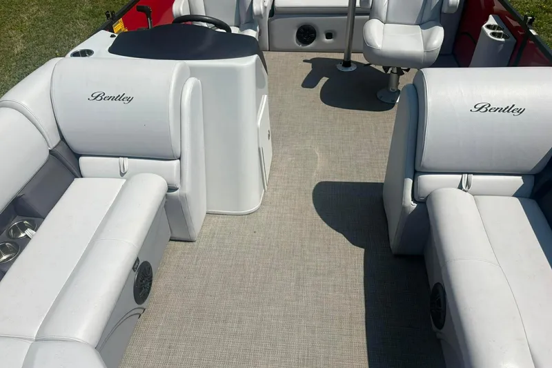 Slide: The Image of 2023 Bentley Pontoons Legacy 223 SB interior with plush seating and modern design. - 4