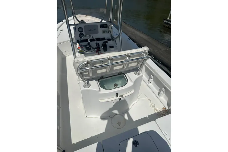 Slide: The Image of 2015 Sea Hunt BX 22 Pro boat interior with steering console and seating. - 10