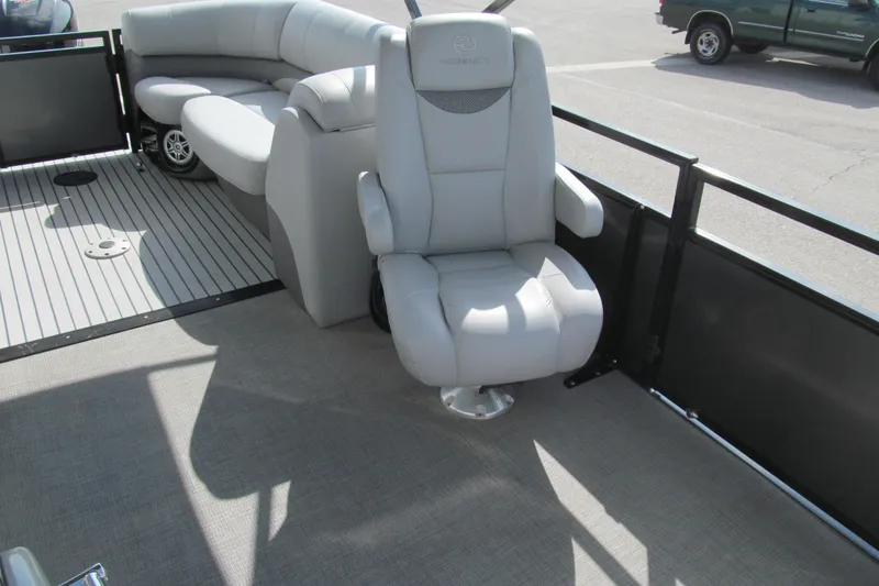 Slide: The Image of 2017 Regency 220 LE3 boat interior with plush seating and modern design. - 12