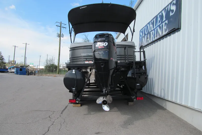 Slide: The Image of 2017 Regency 220 LE3 pontoon boat with powerful outboard motor at Stokley's Marine. - 4
