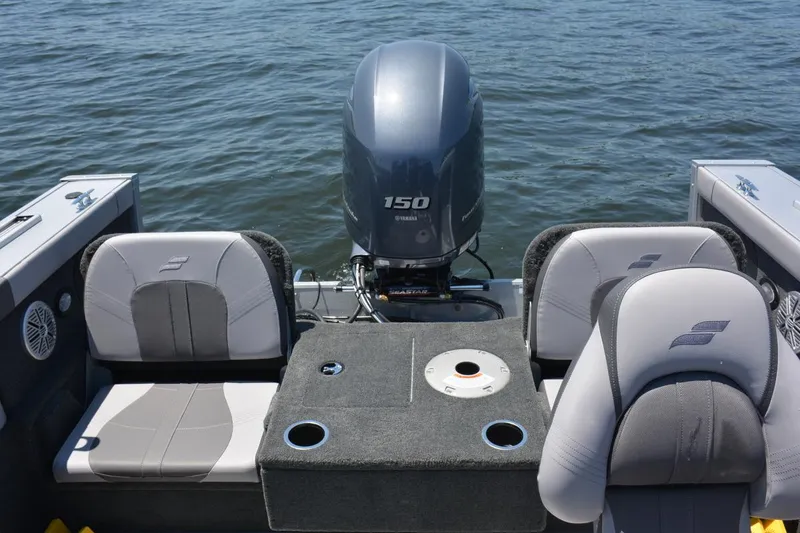Slide: The Image of Manufacturer Provided Image: Starcraft Superfisherman 186 boat, rear view with motor, on calm water. - 10