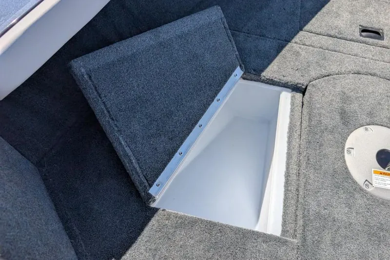 Slide: The Image of Carpeted storage compartment in 2026 Starcraft Superfisherman 186 boat. - 21