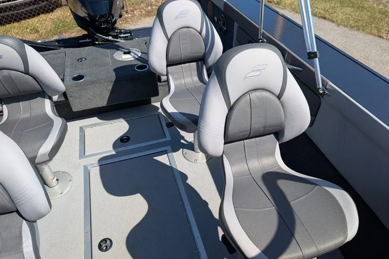 Slide: The Image of 2026 Starcraft Superfisherman 186 boat interior with gray seating and fishing deck. - 25