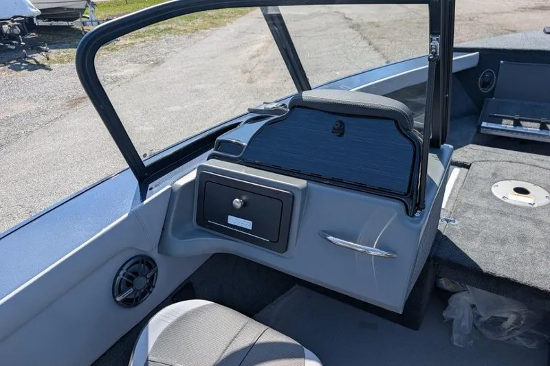 Slide: The Image of 2026 Starcraft Superfisherman 186 boat interior with seating and storage compartments. - 31