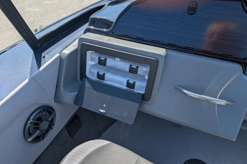 Slide: The Image of 2026 Starcraft Superfisherman 186 boat interior with storage compartment and speaker. - 32