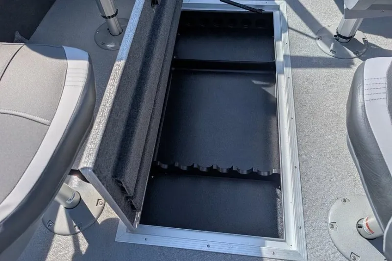 Slide: The Image of 2026 Starcraft Superfisherman 186 boat interior with open storage compartment and seating. - 33