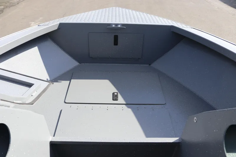 Slide: The Image of 2026 Alumaweld Stryker 202 boat interior, featuring spacious storage compartments and sleek design. - 17