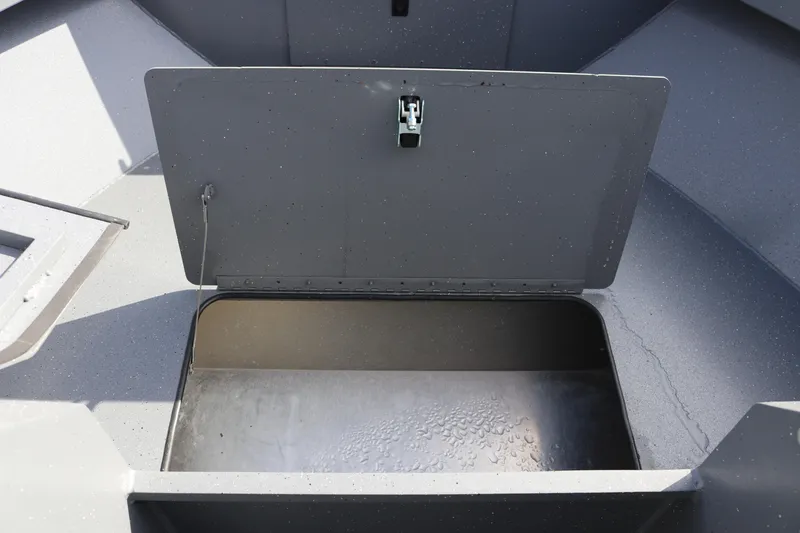 Slide: The Image of Open storage compartment in 2026 Alumaweld Stryker 202 boat. - 21