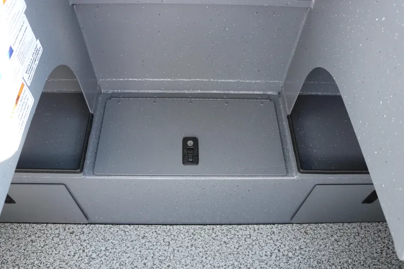 Slide: The Image of 2026 Alumaweld Stryker 202 boat storage compartment with speckled gray finish. - 24