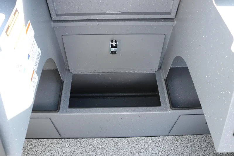 Slide: The Image of 2026 Alumaweld Stryker 202 boat storage compartment with secure latch and durable design. - 25