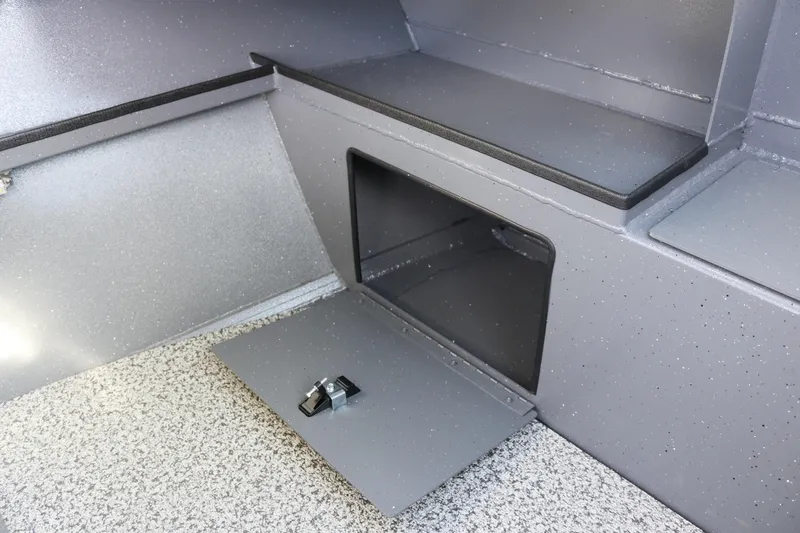 Slide: The Image of 2026 Alumaweld Stryker 202 boat interior storage compartment with open hatch. - 27