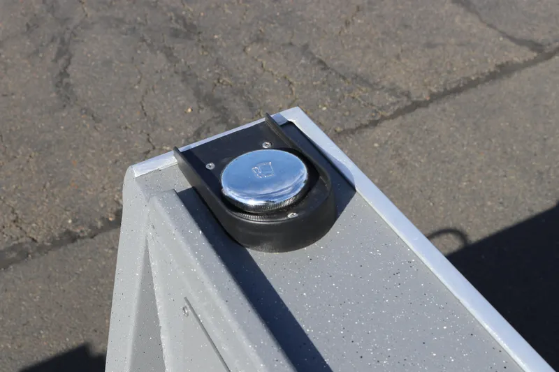 Slide: The Image of Close-up of Alumaweld Stryker 2026 boat detail on pavement background. - 28