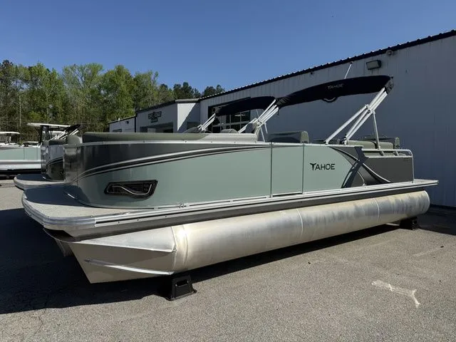 The Image of 2026 Tahoe LTZ 23 FT Quad Lounger pontoon boat outdoors. - 1