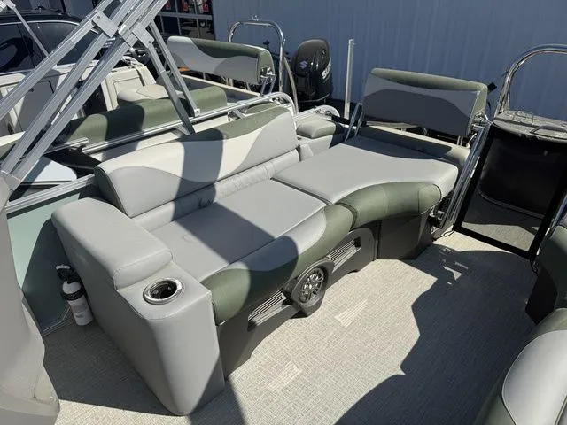 Slide: The Image of 2026 Tahoe LTZ Quad Lounger with luxurious seating and cup holders. - 13