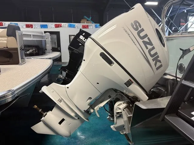 Slide: The Image of 2026 Tahoe LTZ boat with Suzuki outboard motor. - 15