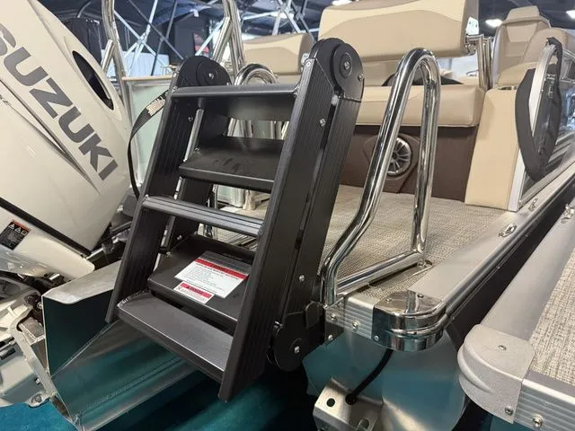 Slide: The Image of 2026 Tahoe LTZ boat with Suzuki engine and ladder. - 17