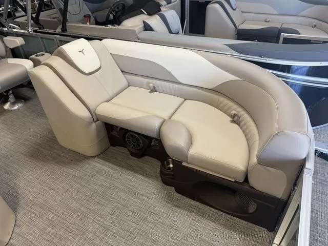 Slide: The Image of Luxurious seating in 2026 Tahoe LTZ Quad Lounger boat. - 7