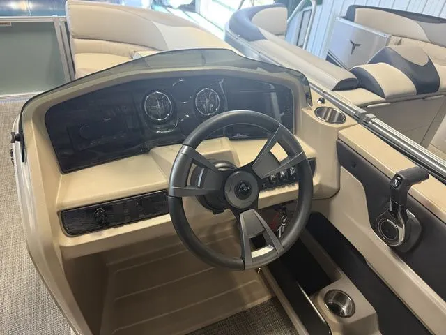Slide: The Image of Interior view of 2026 Tahoe LTZ boat with steering console. - 9