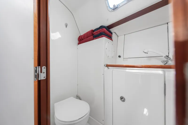 Slide: The Image of Navigation equipment on 2003 Beneteau 411 yacht, featuring radar and communication devices. - 17