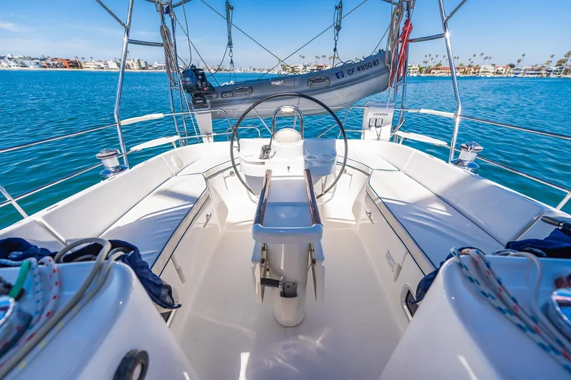 Slide: The Image of Cockpit view of a 2003 Beneteau 411 sailboat with ropes and winch. - 31