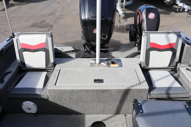 Slide: The Image of 2017 Lowe Fish & Ski 175 boat interior with seating and motor. - 13