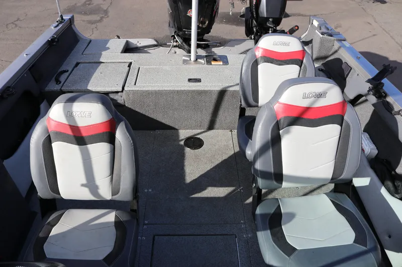 Slide: The Image of 2017 Lowe Fish & Ski 175 boat interior with four seats and storage compartments. - 4