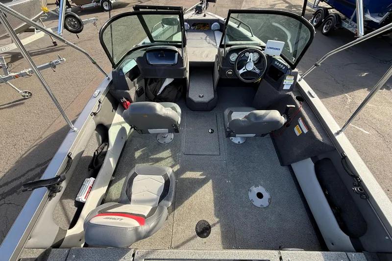 Slide: The Image of 2017 Lowe Fish & Ski 175 boat interior with seating and steering console. - 6