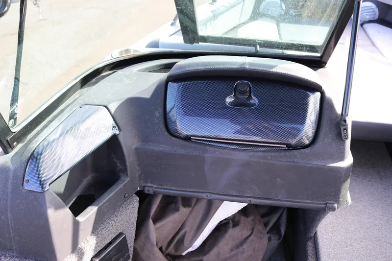 Slide: The Image of 2017 Lowe Fish & Ski 175 boat dashboard with storage compartment and windshield. - 8