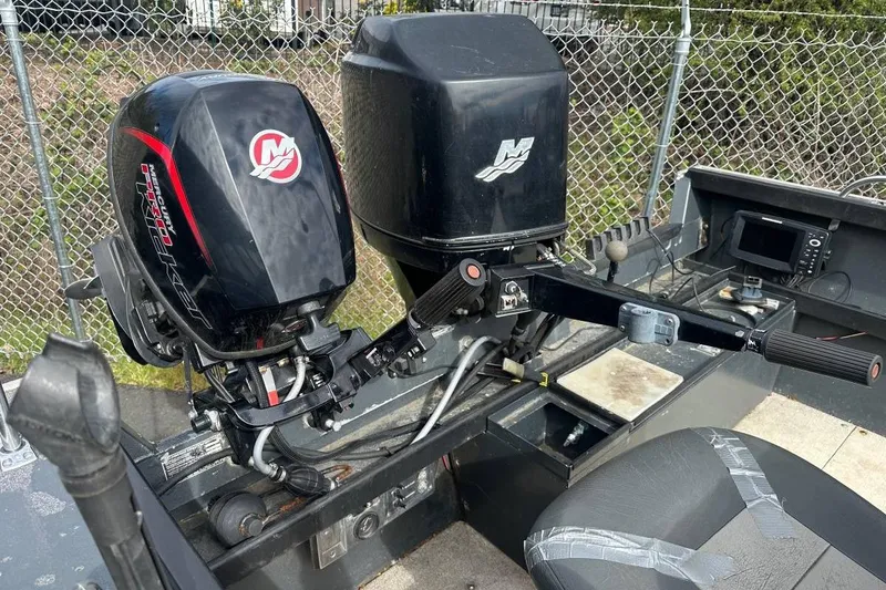 Slide: The Image of 1992 Alumaweld Super Vee Mechanic's Special boat with dual outboard motors. - 4
