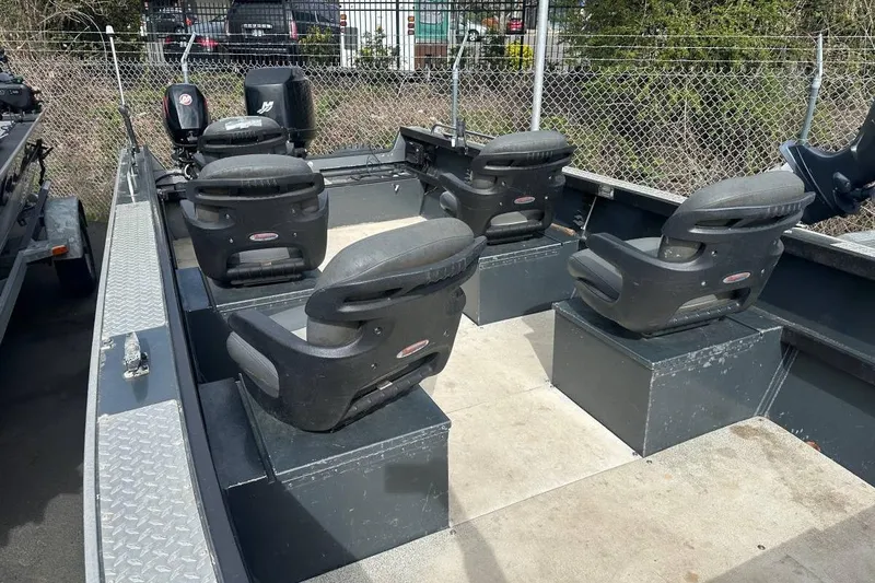 Slide: The Image of 1992 Alumaweld Super Vee Mechanic's Special boat interior with four swivel seats. - 6