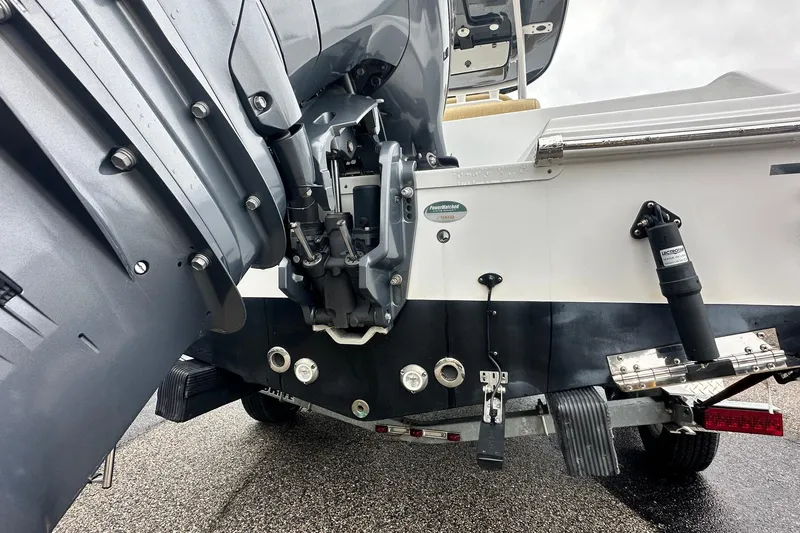 Slide: The Image of 2022 Sportsman Open 212 Center Console boat with Yamaha outboard motor detail. - 10