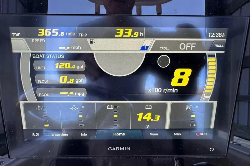 Slide: The Image of Garmin display on 2022 Sportsman Open 212 Center Console showing trip and boat status. - 12