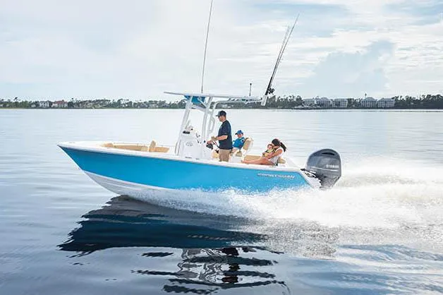 Slide: The Image of Manufacturer Provided Image: 2022 Sportsman Open 212 Center Console boat cruising on calm water. - 13