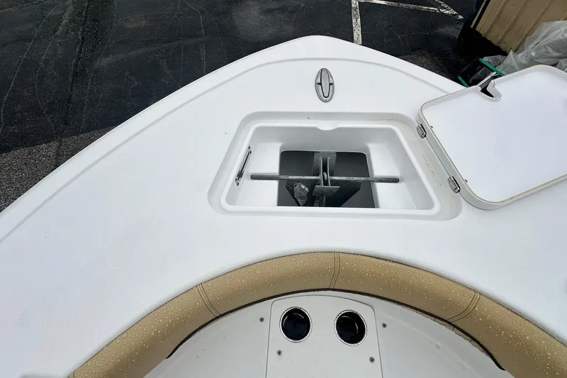 Slide: The Image of 2022 Sportsman Open 212 Center Console boat anchor compartment detail. - 27