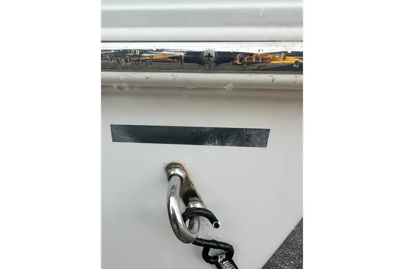 Slide: The Image of Close-up of a 2022 Sportsman Open 212 Center Console boat detail. - 8