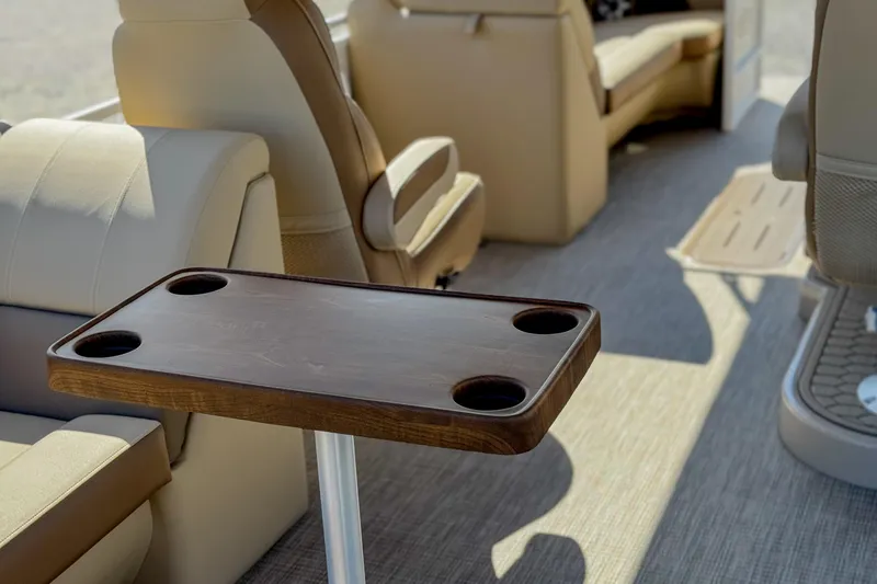 Slide: The Image of Luxurious interior of 2026 Veranda VR235L with elegant seating and wooden cup holder table. - 10