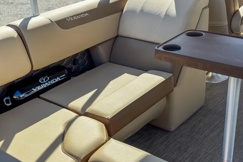 Slide: The Image of Luxurious seating on 2026 Veranda VR235L pontoon boat with cupholders and elegant design. - 9