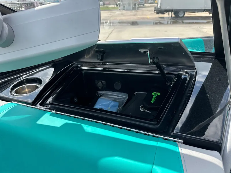 Slide: The Image of Interior of 2022 Malibu Wakesetter 23 LSV with storage compartment. - 15