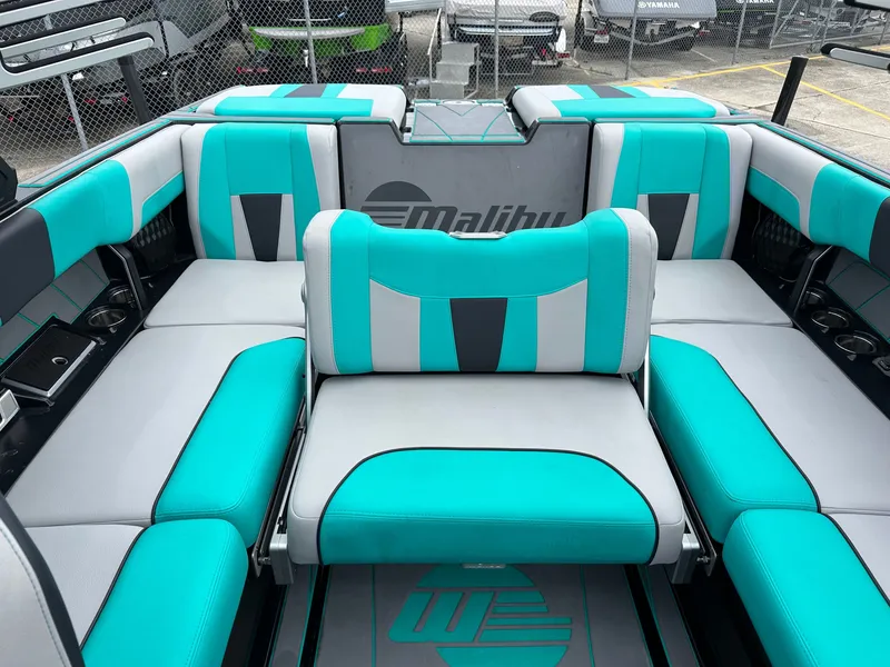 Slide: The Image of Interior of 2022 Malibu Wakesetter 23 LSV with turquoise seating. - 18